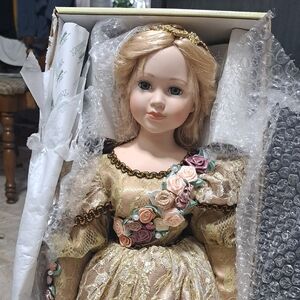 Elegant Porcelain Doll with Floral Dress